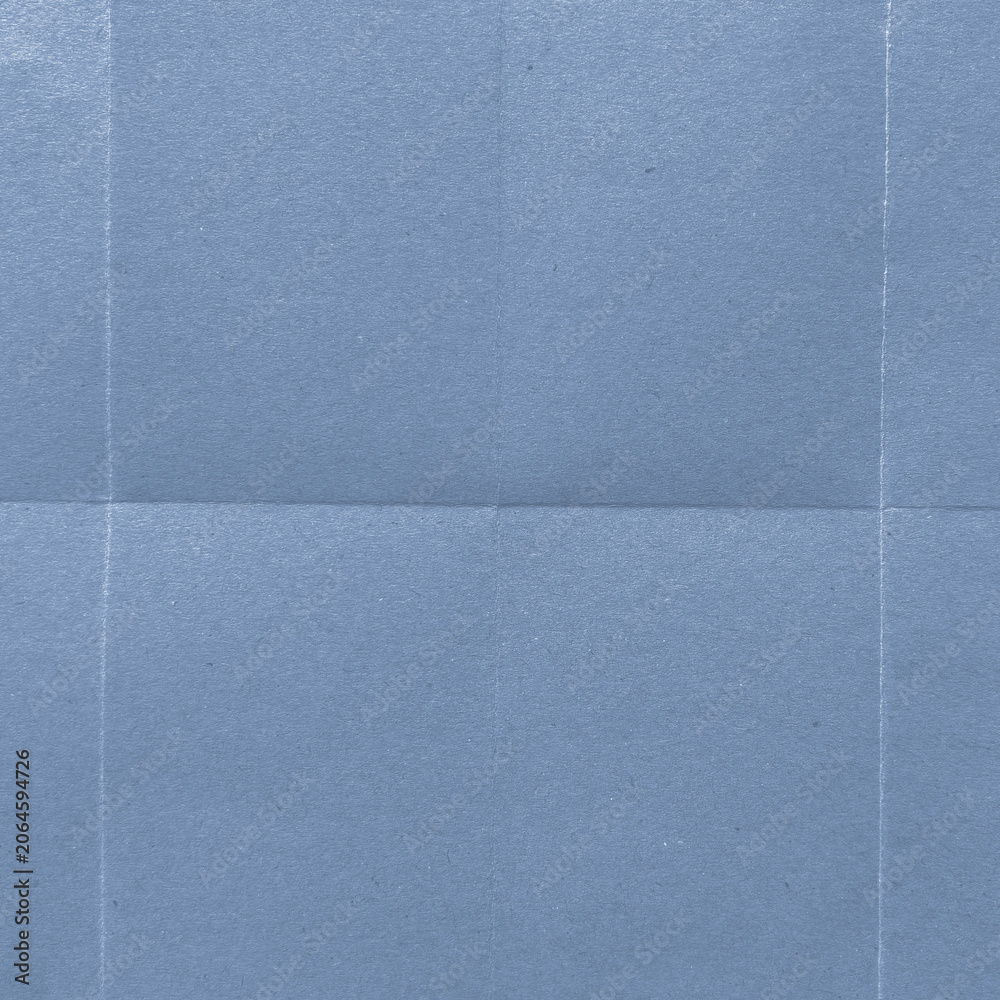 Fototapeta premium Textured blue paper background with copy space