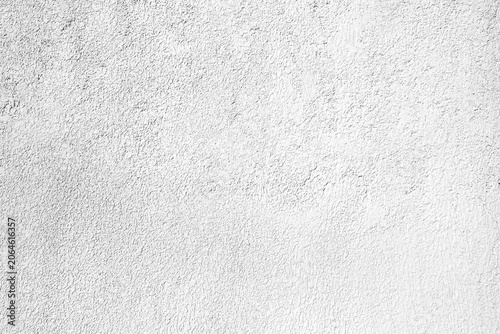 White stucco wall texture with rough plaster finish. Clean architectural background featuring detailed surface patterns, ideal for design, construction, and graphic projects.
