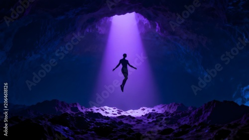 Person floating in cave with light beam