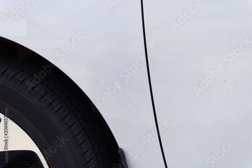 Flash Rust on White Car Paint – Close‑Up