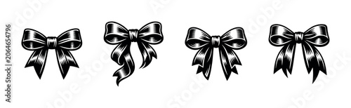 Fényképezés Collection of four distinct black bow tie illustrations on a white background