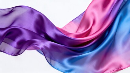 Colorful flowing fabric on white background