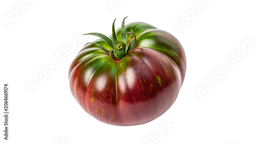 Foto Fresh organic heirloom dark purple and red tomato isolated on transparent backgr