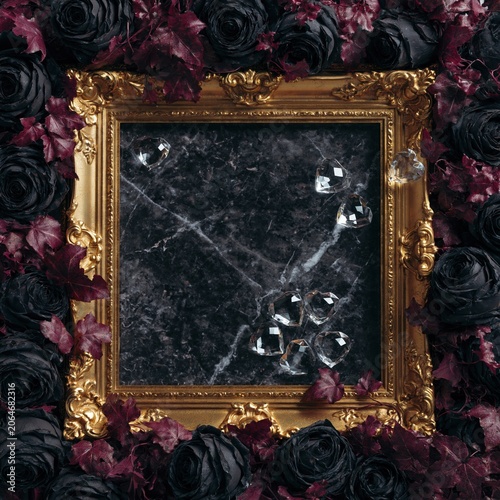 Ornate golden frame on black roses and burgundy leaves. Flat lay with heart crystals on black marble background. Gothic romantic design template