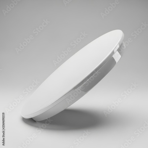 Minimalist white object on a clean gray background.