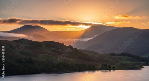Misty Mountain Sunrise Over a Serene Lake Landscape.