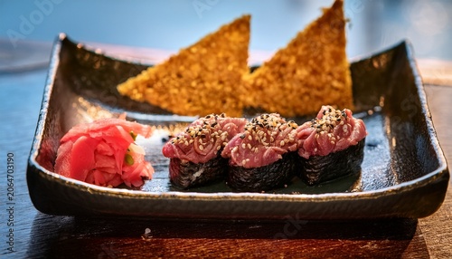 japanese street food close up hida beef sushi and cracker at takayama japan