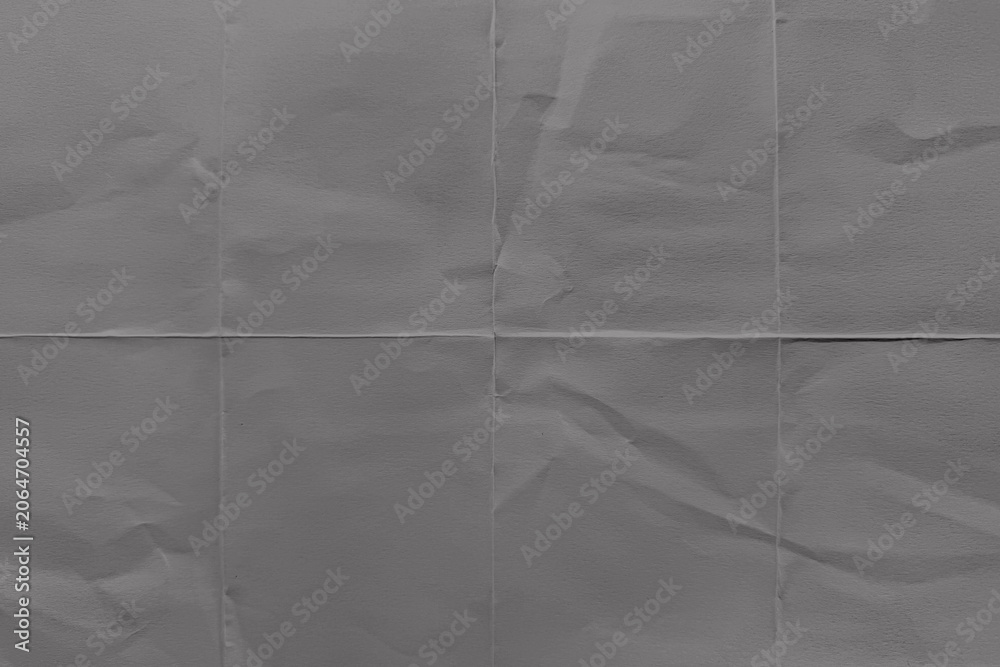 Fototapeta premium Gray textured paper background with subtle folds