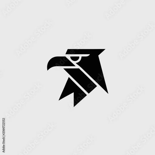 Minimalist black eagle head logo design.