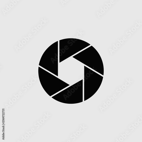 Black camera aperture icon on plain background.