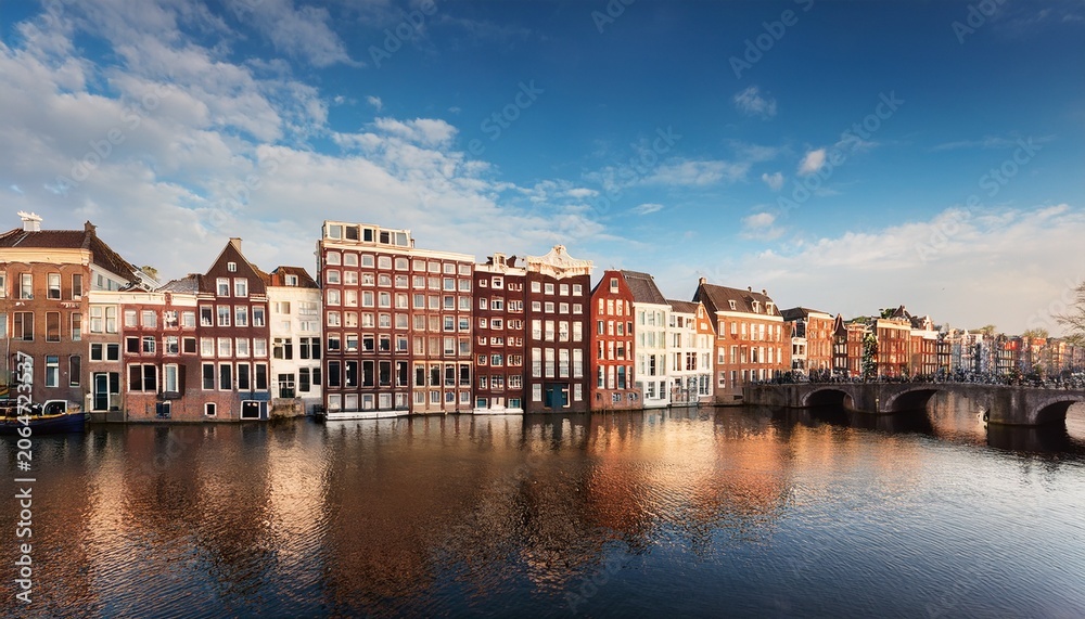 Naklejka premium old buildings in amsterdam