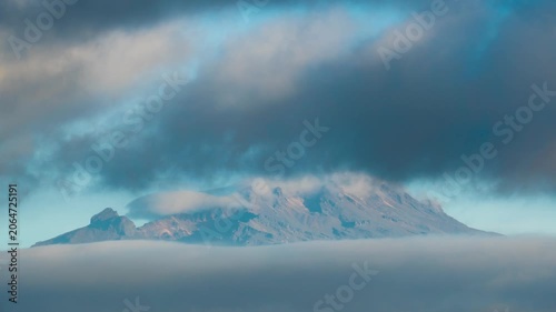 Iztaccihuatl volcano summit covered by moving clouds