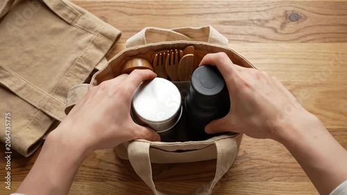 Reusable container bottle wooden utensil cutlery stainless steel lunch box promoting zero waste lifestyle eco friendly choices