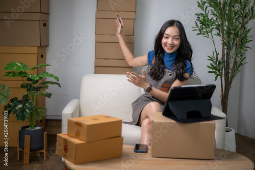 Woman live streaming products for small business ecommerce sale
