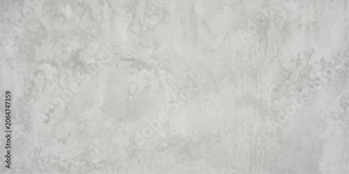 Tableau sur toile Textured Concrete Surface: A close-up view of a light gray concrete surface displaying a subtly textured, mottled pattern with variations in shade, hinting at a weathered or artisanal finish