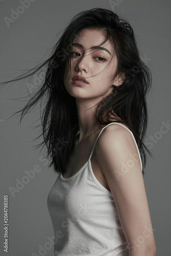 AI generated fine art studio portrait of woman with blowing hair white dress