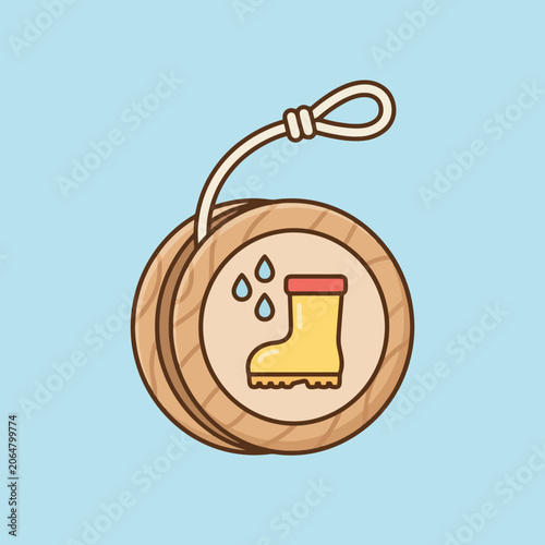 A wooden toy with a yellow boot icon on light blue