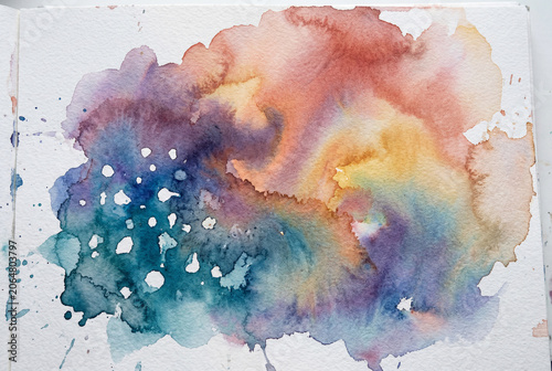 Abstract colorful wet pigment wash with blending blue purple orange and red colors