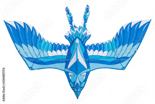 Stylized bird shaped kite in shades of blue and white isolated on white