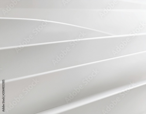 Abstract background of white curved parallel lines and shapes. Minimalist architectural detail.