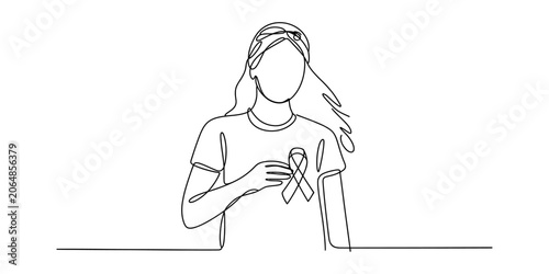 Foto Continuous one line drawing of a woman holding a cancer awareness ribbon on her