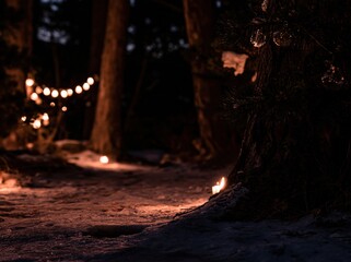 Enchanting winter forest at night with glowing candles and fairy lights for Christmas holiday backgrounds and festive seasonal greeting cards