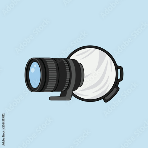 A digital camera lens attached to a circular light reflector