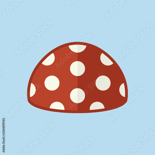 Red mushroom cap with white polka dots on a blue background