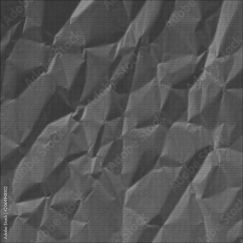 Obraz na plátně A close-up view of a crumpled gray surface with many folds and creases