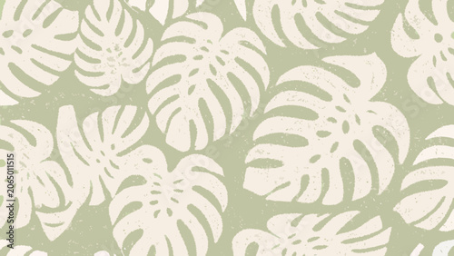 Monstera leaf pattern displays a textured pale green and off white botanical illustration