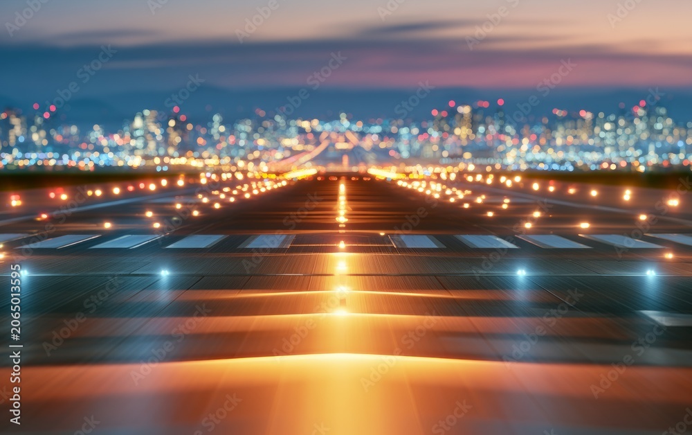 Fototapeta premium Aerial View of Airport Runway System Glowing with Guidance Lights at Dusk