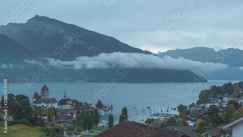 Spiez Switzerland time lapse night to day city skyline at Lake Thun