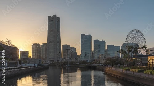 Yokohama Kanagawa Japan time lapse city skyline day to night sunset cityscape at Minato Mirai and Ooka river