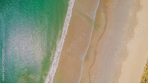 Schilderij op canvas Aerial view of waves rolling onto a beach at Cape Northumberland, South Australi