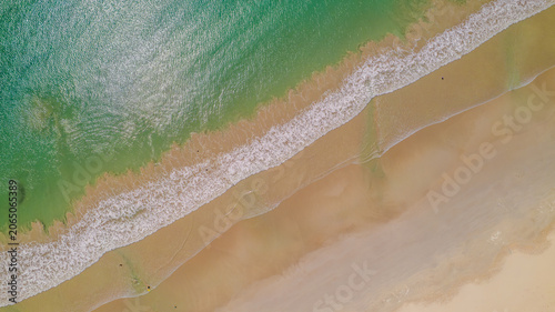 Bild auf Leinwand Aerial view of waves rolling onto a beach at Cape Northumberland, South Australi