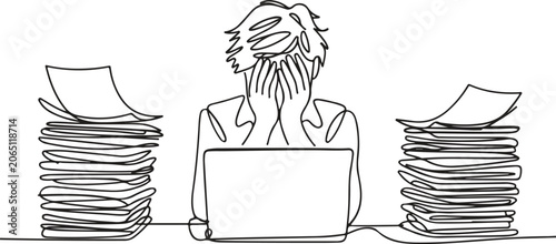 Photos A stressed man sits at a desk with large stacks of paperwork on either side of h