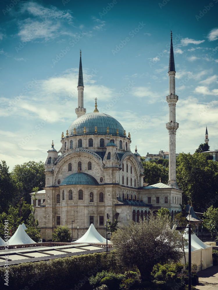 Naklejka premium Mosque in Istanbul against the backdrop of a beautiful sunset sky. Byzantine type of mosque.