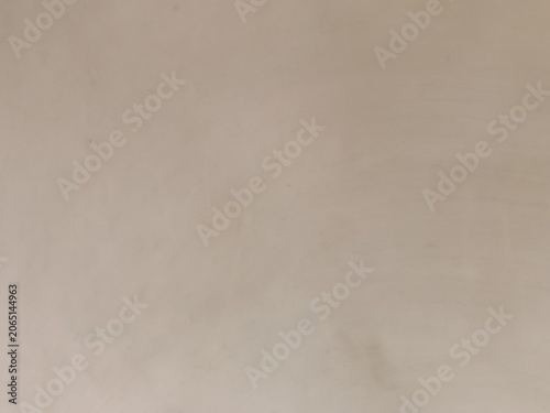 Fotografie Smooth beige plaster wall texture
