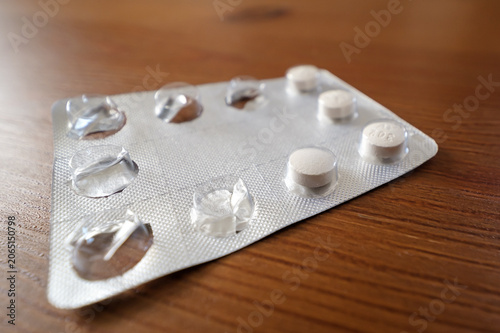 View of a blister pack of paracetamol pills on a table