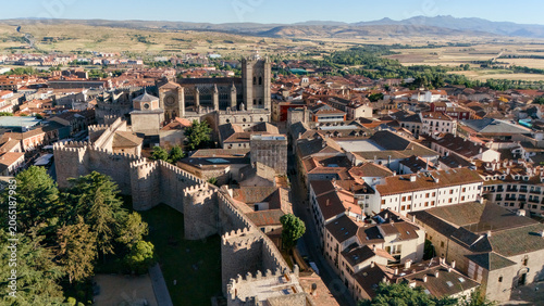 Photos Stone battlements and gothic cathedral towers rise above red rooftops Avila