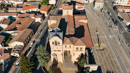 Quadro su tela Top down aerial view of romanesque church with dome and railway tracks in Avila