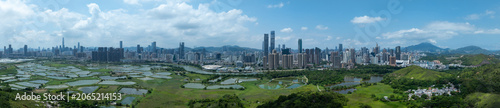 Photography Aerial view of rural green fields with fish ponds on Hong Kong and the skylines