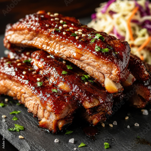 Barbecue glazed pork ribs with sesame and herbs