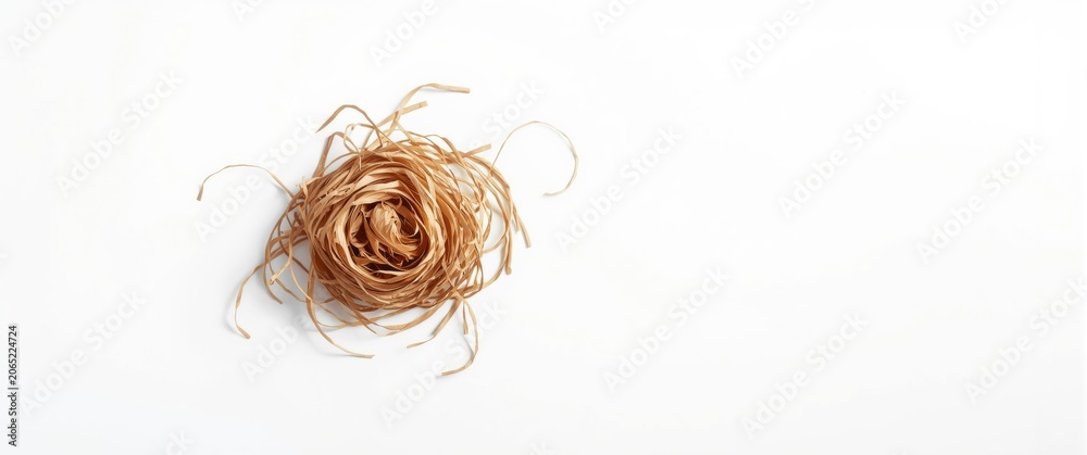 Obraz premium High key white background displaying natural wood shaving texture