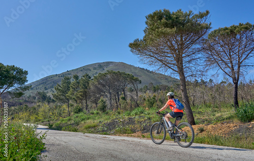 Active senior woman riding ...