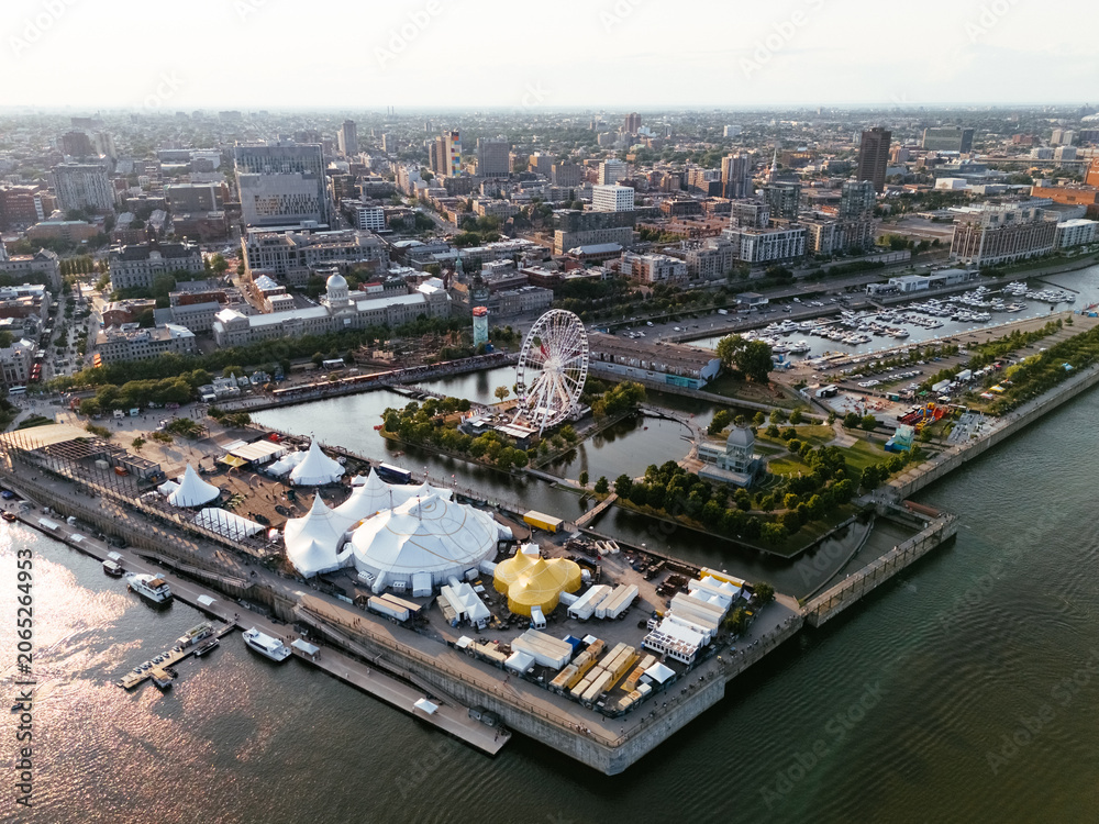 Obraz premium Drone view of Old Port City waterfront park with an entertainment venue. Montreal, Canada