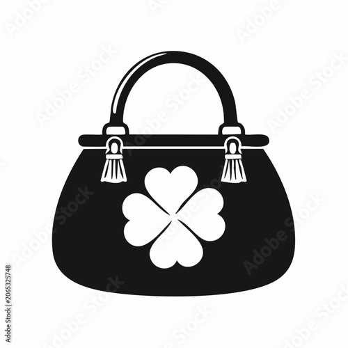 Black and white icon of a handbag with a clover leaf design