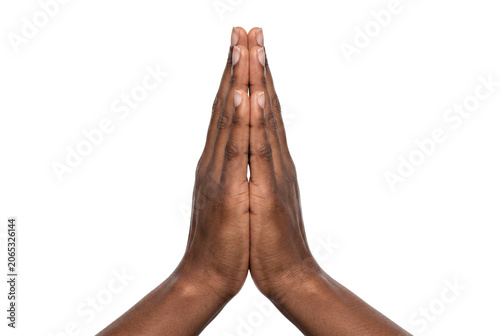 Fotografie Dark skinned hands pressed together in prayer and greeting