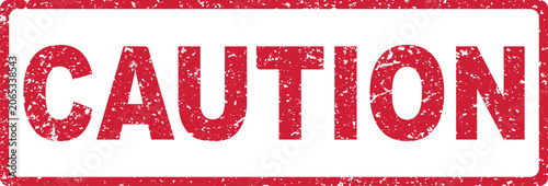Red grunge caution stamp sign on white 