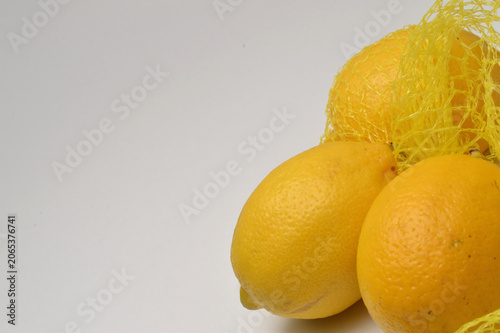 lemons on a white background close up with generous copy space, horizontal composition border layout